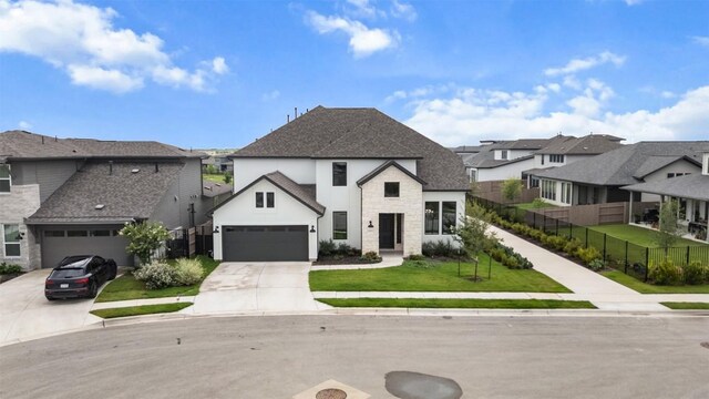 8405 Ambergill Ct, Austin, TX 78744 - view of front of home featuring driveway, a residential view, a shingled roof, and a garage