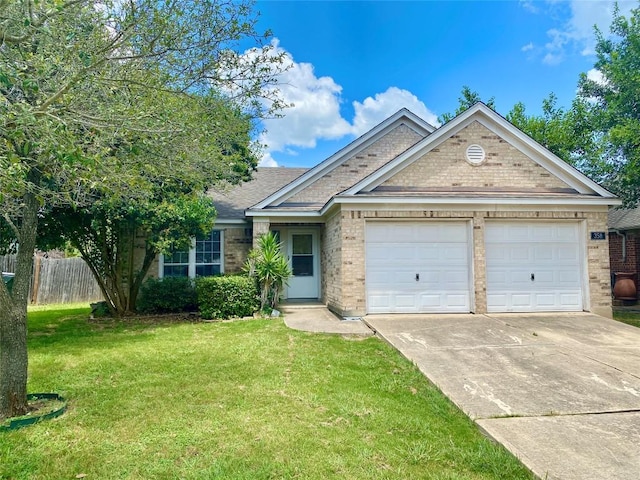 358 Spring, Kyle, TX 78640 - view of front facade featuring concrete driveway, an attached garage, brick siding, and roof with shingles