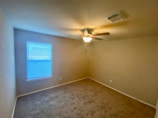 358 Spring, Kyle, TX 78640 - carpeted empty room with ceiling fan and baseboards