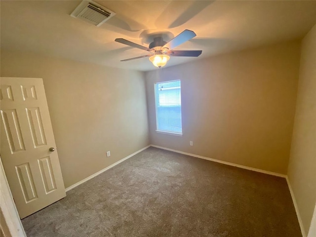 358 Spring, Kyle, TX 78640 - spare room featuring carpet flooring and ceiling fan