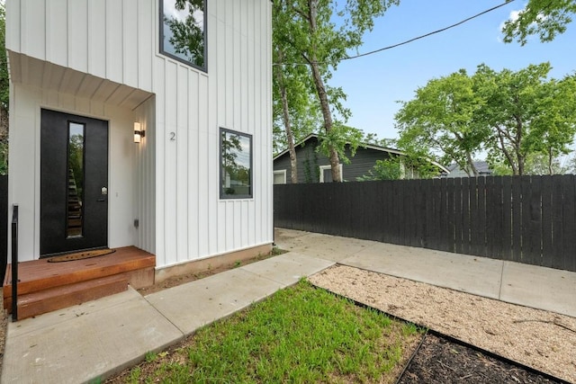 4428 Jinx Ave Unit 2, Austin, TX 78745 - property entrance featuring board and batten siding and a patio