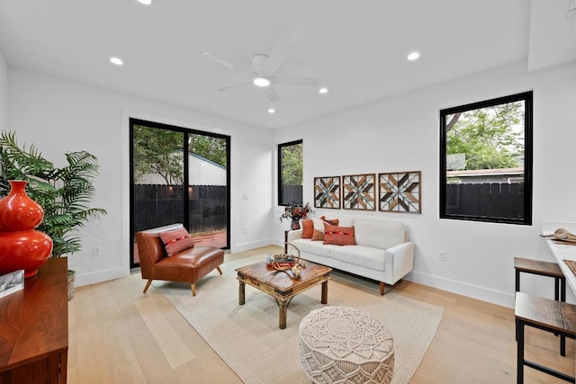 4428 Jinx Ave Unit 2, Austin, TX 78745 - living room with light wood-style flooring, a ceiling fan, and recessed lighting