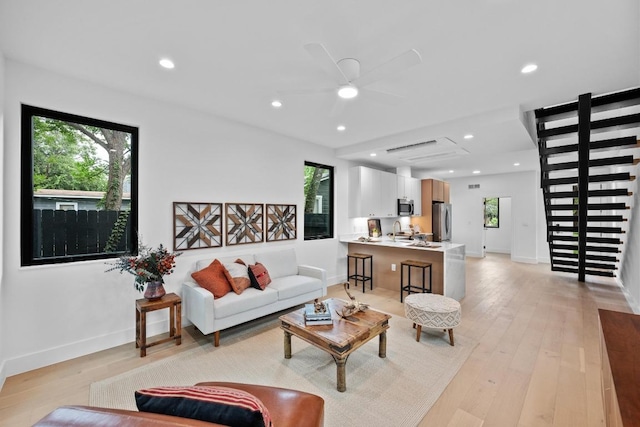 4428 Jinx Ave Unit 2, Austin, TX 78745 - living room featuring a ceiling fan, light wood-type flooring, and recessed lighting