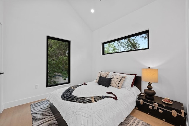 4428 Jinx Ave Unit 2, Austin, TX 78745 - bedroom with wood finished floors, recessed lighting, and high vaulted ceiling