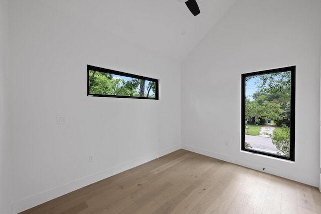 4428 Jinx Ave Unit 2, Austin, TX 78745 - empty room featuring high vaulted ceiling and light wood-style floors