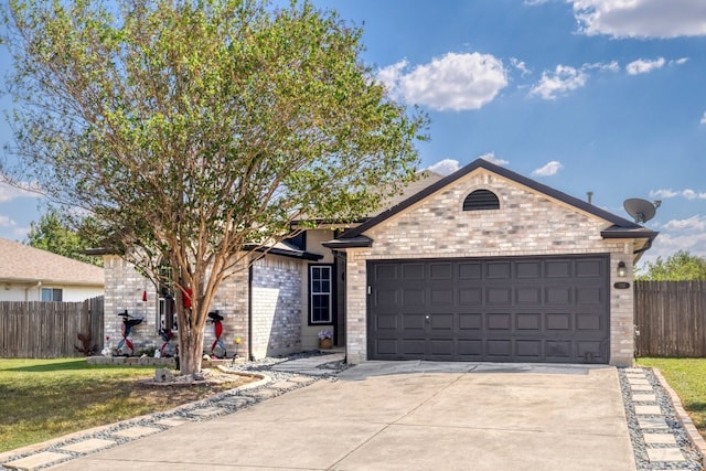 203 Endeavour, Kyle, TX 78640 - single story home featuring driveway, a garage, and brick siding