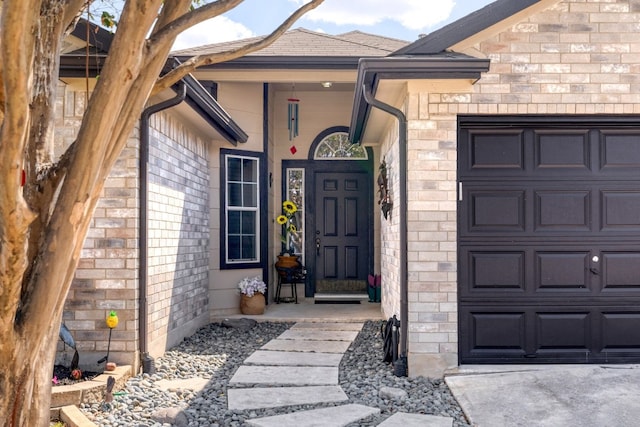 203 Endeavour, Kyle, TX 78640 - entrance to property with a garage and stone siding