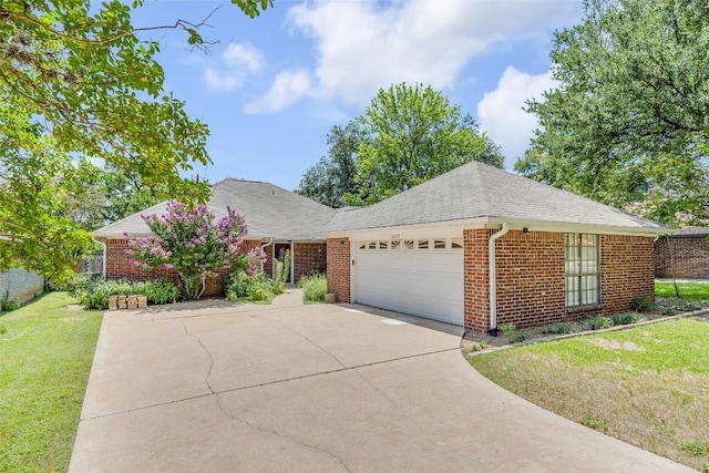 10007 Brantley Bnd, Austin, TX 78748 - single story home with an attached garage, concrete driveway, a front yard, brick siding, and a shingled roof