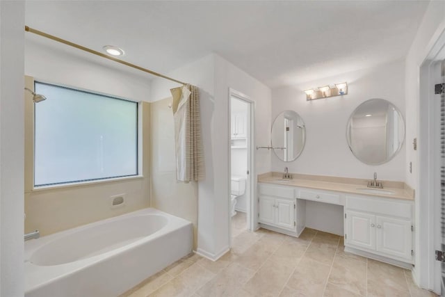 10007 Brantley Bnd, Austin, TX 78748 - full bathroom featuring a bath, double vanity, and tile patterned floors