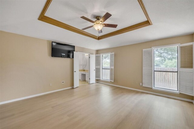 10007 Brantley Bnd, Austin, TX 78748 - spare room with a raised ceiling, light wood-style flooring, ceiling fan, and ornamental molding