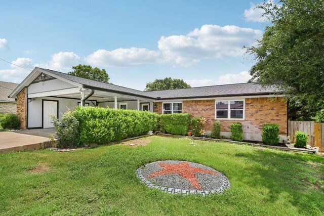 709 Harvey Ave, Burnet, TX 78611 - single story home featuring brick siding