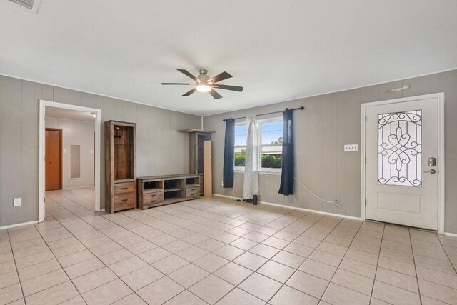 709 Harvey Ave, Burnet, TX 78611 - entrance foyer with ceiling fan and light tile patterned floors
