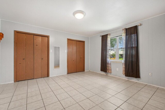 709 Harvey Ave, Burnet, TX 78611 - unfurnished bedroom featuring ornamental molding