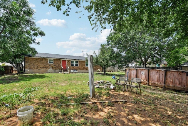 709 Harvey Ave, Burnet, TX 78611 - back of property with brick siding