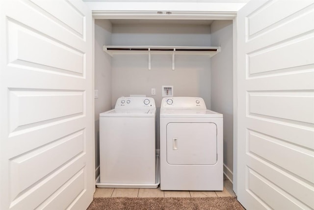 1904 Cleese Dr Unit 172, Austin, TX 78741 - laundry area featuring separate washer and dryer and light tile patterned floors