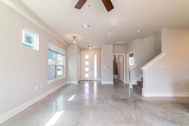 1904 Cleese Dr Unit 172, Austin, TX 78741 - entryway featuring finished concrete flooring, stairs, and a ceiling fan