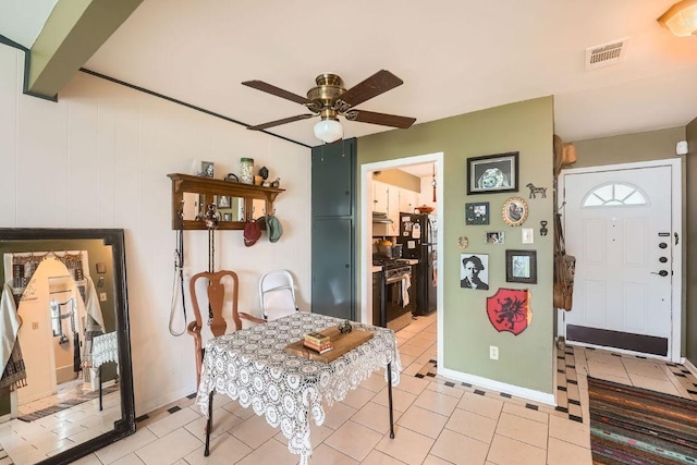 3309 Whitepine Dr, Austin, TX 78757 - dining area with ceiling fan and light tile patterned flooring