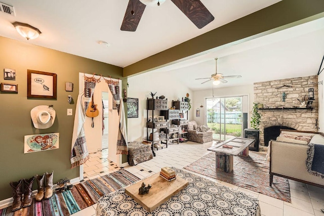3309 Whitepine Dr, Austin, TX 78757 - tiled living area featuring ceiling fan and a fireplace