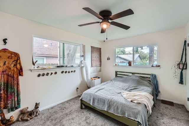 3309 Whitepine Dr, Austin, TX 78757 - bedroom with carpet floors and a ceiling fan