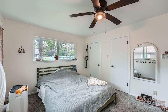 3309 Whitepine Dr, Austin, TX 78757 - carpeted bedroom featuring baseboards and ceiling fan