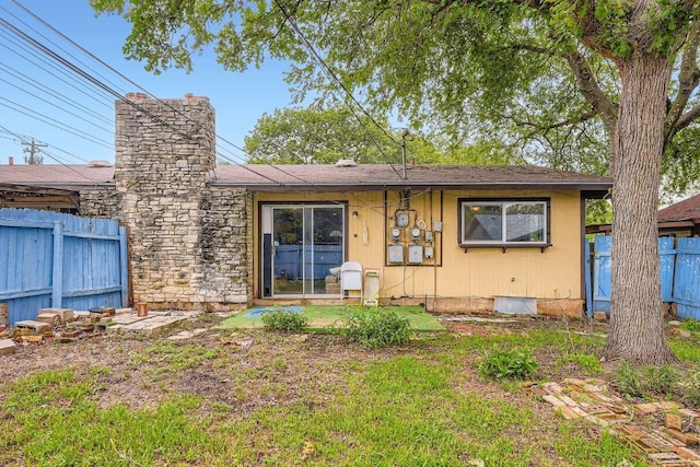 3309 Whitepine Dr, Austin, TX 78757 - back of house featuring a chimney