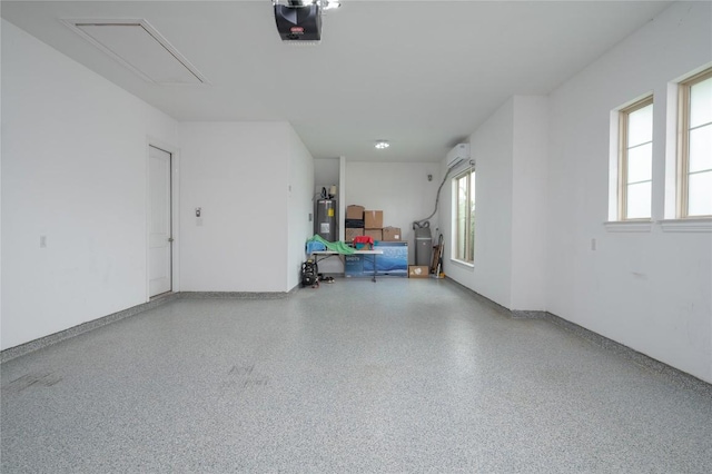 1404 Scenic Oaks Dr, Georgetown, TX 78628 - garage featuring electric water heater and a garage door opener