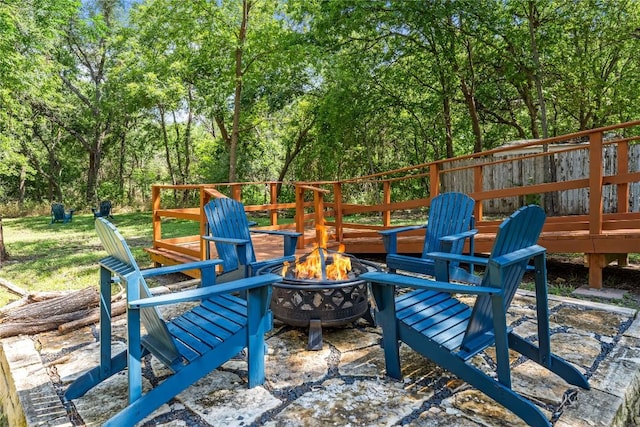 7801 Elderberry Dr, Austin, TX 78745 - view of patio / terrace with an outdoor fire pit