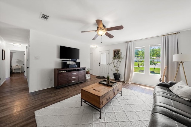 7801 Elderberry Dr, Austin, TX 78745 - living room featuring ceiling fan and wood finished floors