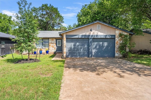 7801 Elderberry Dr, Austin, TX 78745 - single story home with stone siding, concrete driveway, a front lawn, and a garage