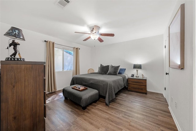 7801 Elderberry Dr, Austin, TX 78745 - bedroom featuring wood finished floors and ceiling fan