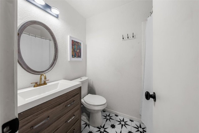 7801 Elderberry Dr, Austin, TX 78745 - bathroom featuring vanity and toilet