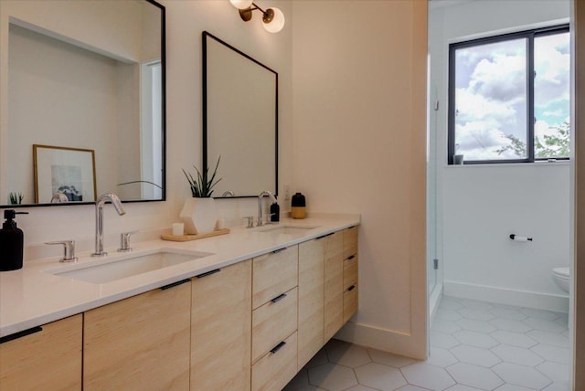 8009 Golden Oaks Ln, Austin, TX 78737 - bathroom featuring double vanity and tile patterned flooring