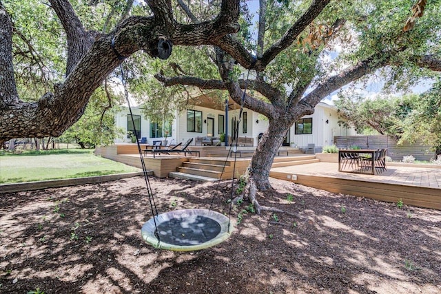 8009 Golden Oaks Ln, Austin, TX 78737 - view of yard with a wooden deck and outdoor dining area