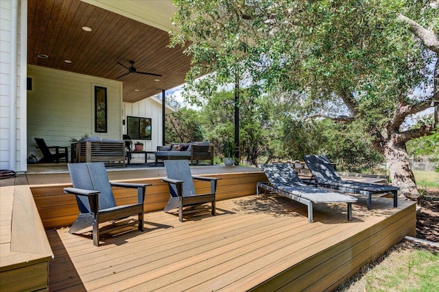 8009 Golden Oaks Ln, Austin, TX 78737 - wooden deck with outdoor lounge area and a ceiling fan