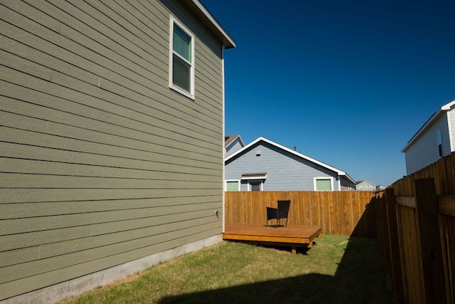 175 Amber Gln, Maxwell, TX 78656 - fenced backyard featuring a wooden deck