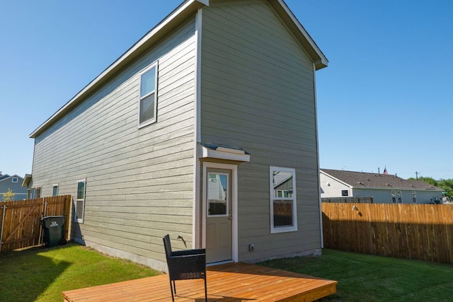 175 Amber Gln, Maxwell, TX 78656 - back of property featuring a wooden deck and a fenced backyard