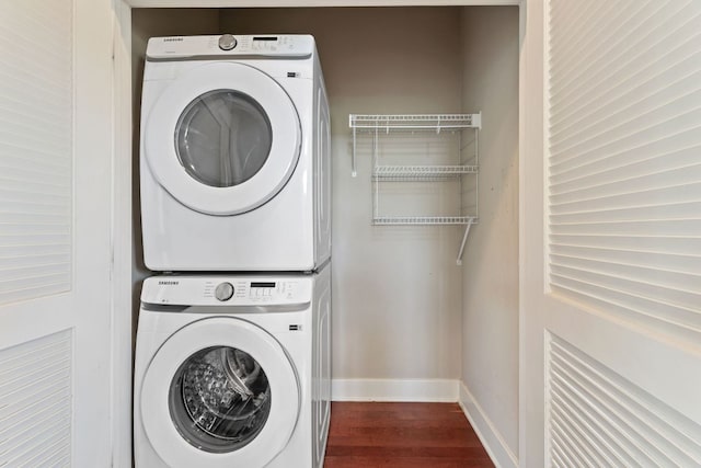 1601 Miriam Ave Unit 216, Austin, TX 78702 - laundry area with stacked washing machine and dryer and dark wood-style floors