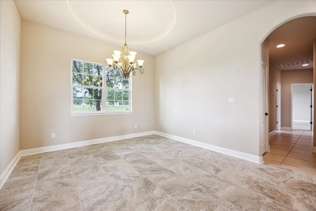 144 Escondido Dr, Del Valle, TX 78617 - unfurnished room featuring arched walkways, a chandelier, and recessed lighting