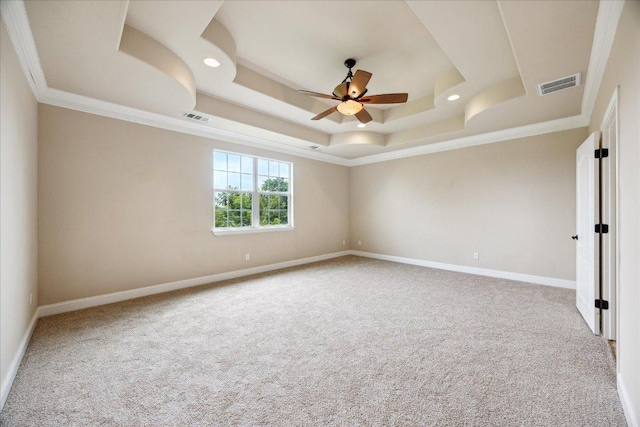 144 Escondido Dr, Del Valle, TX 78617 - spare room with ceiling fan, carpet floors, a raised ceiling, crown molding, and recessed lighting