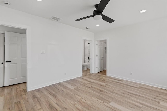 901 Church St N, Georgetown, TX 78626 - unfurnished bedroom featuring light wood-style flooring, recessed lighting, ensuite bathroom, a walk in closet, and ceiling fan