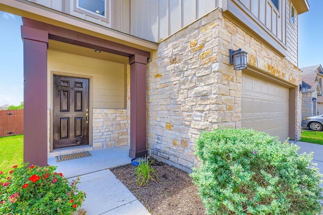 3025 Lions Tail St, Austin, TX 78728 - entrance to property with stone siding, board and batten siding, and a garage