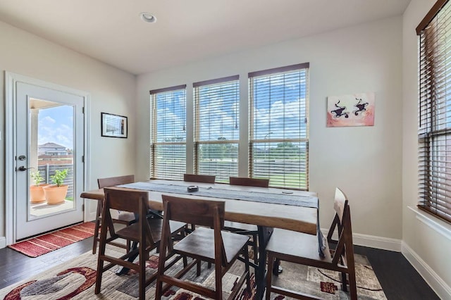 3025 Lions Tail St, Austin, TX 78728 - dining room with dark wood finished floors and baseboards