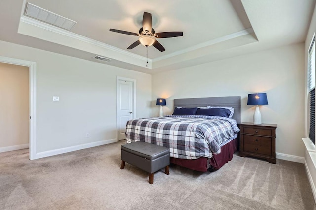 3025 Lions Tail St, Austin, TX 78728 - carpeted bedroom with a tray ceiling, ornamental molding, and a ceiling fan
