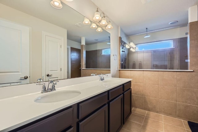 3025 Lions Tail St, Austin, TX 78728 - full bath with double vanity, a walk in shower, and tile patterned flooring