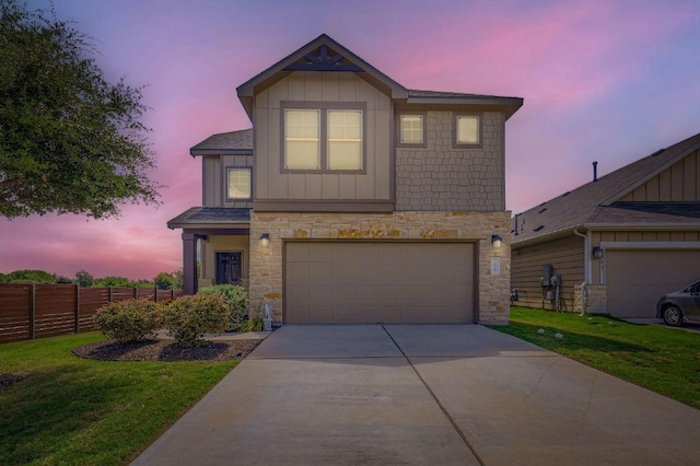 3025 Lions Tail St, Austin, TX 78728 - view of front of home with board and batten siding, stone siding, driveway, and a garage