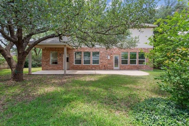 102 Country View Way, Cedar Park, TX 78613 - rear view of house with a patio area, a yard, and brick siding