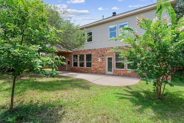 102 Country View Way, Cedar Park, TX 78613 - rear view of property featuring brick siding, a patio, and a lawn