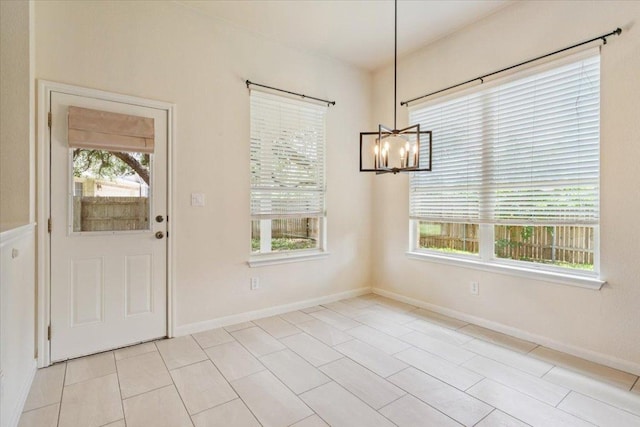 102 Country View Way, Cedar Park, TX 78613 - unfurnished dining area featuring a chandelier and baseboards