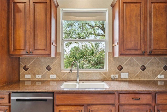 102 Country View Way, Cedar Park, TX 78613 - kitchen with stainless steel dishwasher, brown cabinetry, and tasteful backsplash