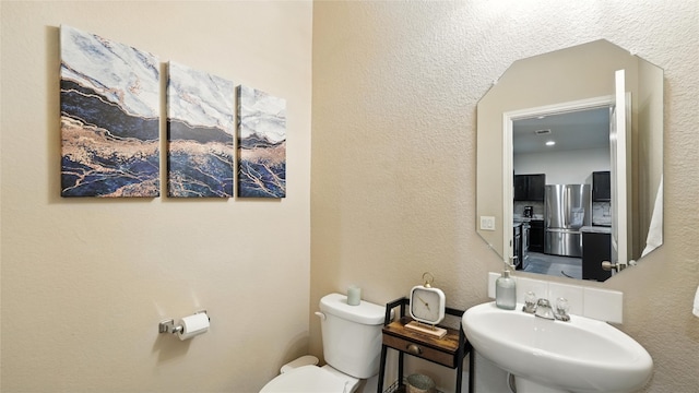 201 Garcitas Creek Ln, Hutto, TX 78634 - bathroom with a textured wall